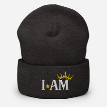 Load image into Gallery viewer, cuffed beanie dark grey, with image phrase "I AM," with image of a crown over the word AM. background: winter themed, Christmas gifts.