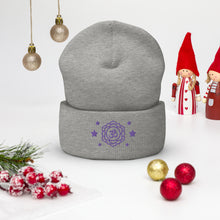Load image into Gallery viewer, cuffed beanie heather grey, with image design of purple third eye chakra symbol, with purple stars. background: winter themed, Christmas gifts.