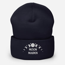 Load image into Gallery viewer, cuffed beanie navy blue, with image phrase "Moon Maiden," and image graphic of moon phases. background: winter themed, Christmas gifts.