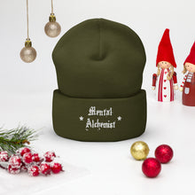 Load image into Gallery viewer, cuffed beanie olive green, with image phrase "Mental Alchemist." background: winter themed, Christmas gifts.