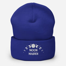 Load image into Gallery viewer, cuffed beanie royal blue, with image phrase "Moon Maiden," and image graphic of moon phases. background: winter themed, Christmas gifts.