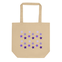 Load image into Gallery viewer, oyster colored tote bag, certified organic, features rows of purple stars, with each row darker than the one above it, creating a striking gradient effect. 4 shades of purple.