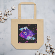 Load image into Gallery viewer, oyster beige tote bag, certified organic, cotton, tote bag, dreamy eye with a crescent moon in the iris, surrounded by soft, whimsical clouds, pink and purple stars, orange highlights.