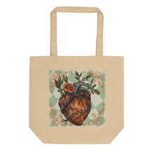 Load image into Gallery viewer, oyster colored tote bag, certified organic. Image design: Red illustrated heart with vines and rose, wavy green checkered print background behind the image