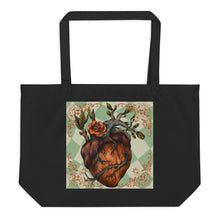 Load image into Gallery viewer, large black tote bag, certified organic. Image design: Red illustrated heart with vines and rose, wavy green checkered print background behind the image