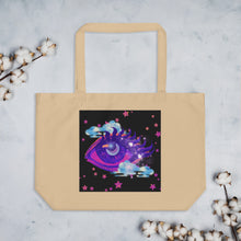 Load image into Gallery viewer, large oyster beige tote bag, certified organic, tote bag, dreamy eye with a crescent moon in the iris, surrounded by soft, whimsical clouds, pink and purple stars, orange highlights.