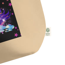 Load image into Gallery viewer, close up image of large oyster beige tote bag, showing tag certified organic, tote bag, dreamy eye with a crescent moon in the iris, surrounded by soft, whimsical clouds, pink and purple stars, orange highlights.