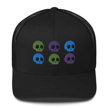 Load image into Gallery viewer, retro trucker hat black , with image design of 6 purple, green, and blue skulls, 2 of each color, in two rows. Front view.