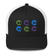 Load image into Gallery viewer, retro trucker hat black white , with image design of 6 purple, green, and blue skulls, 2 of each color, in two rows. Front view.