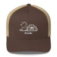 Load image into Gallery viewer, retro trucker hat/cap brown khaki , with image design of an eye in a cloud, with moon crescent and stars, with the word "Breathe" underneath the image. Front view.