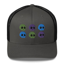 Load image into Gallery viewer, retro trucker hat charcoal grey black, with image design of 6 purple, green, and blue skulls, 2 of each color, in two rows. Front view.