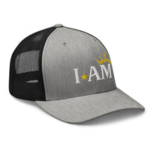 Load image into Gallery viewer, retro trucker hat heather grey black, with image phrase: "I AM," with image graphic of a gold crown over the letter M. side view.