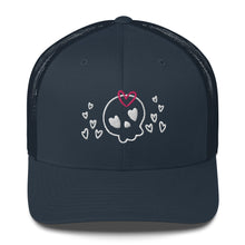 Load image into Gallery viewer, retro trucker hat/cap navy blue , with image design of a cartoonish cute skull with heart eyes, a heart bow, and stars. Front view.