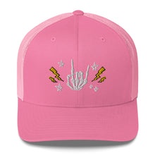Load image into Gallery viewer, retro trucker hat/cap pink, with image design of rock on skeleton hand, pentagram stars, lightning symbols. Front view.