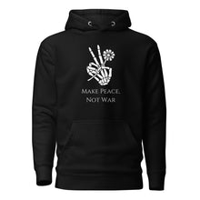 Load image into Gallery viewer, black unisex hoodie, with pockets, with image phrase "Make peace, not war." with image graphic of a skeleton hand holding a daisy flower, and gesturing the peace sign. Front view.