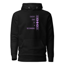 Load image into Gallery viewer, Black unisex hoodie, with pockets, with image phrase: "Every end is a beginning." with image of moon phases, from new moon, to full moon, back to new moon. Front view.