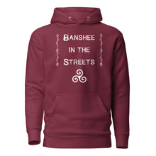 Load image into Gallery viewer, unisex maroon hoodie, with image phrase "Banshee in the Streets," with image symbol Triskelion. Front View.