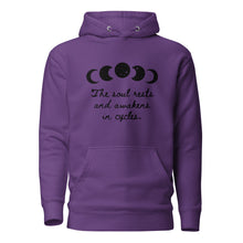 Load image into Gallery viewer, unisex purple hoodie with image phrase "The soul rests and awakens in cycles." With image graphic of silhouette moon phases with star cut outs. Front view.