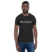 Load image into Gallery viewer, man modeling/wearing unisex black heather t-shirt, with Image phrase: white text - "Mental Alchemist." Front view.