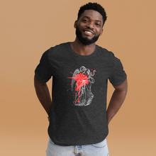 Load image into Gallery viewer, man modeling/wearing unisex dark grey heather t-shirt, with image design of an angel kissing a woman, with a red paint splat seen through their outlines. Front view.