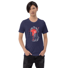 Load image into Gallery viewer, man modeling/wearing unisex heather midnight navy blue t-shirt, with image design of an angel kissing a woman, with a red paint splat seen through their outlines. Front view.