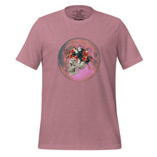 Load image into Gallery viewer, unisex heather orchid pink t-shirt, with image design: side profile of a skull wearing a crown/hat of black roses, red poppies, thorny vines, and white butterflies, with a pink-red moon behind it. Front View.