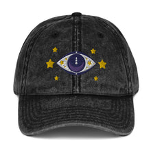 Load image into Gallery viewer, vintage denim cap black, with image design of blue eye of protection/evil eye/third eye, with stars. Front view.