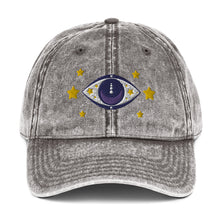 Load image into Gallery viewer, vintage denim cap charcoal grey, with image design of blue eye of protection/evil eye/third eye, with stars. Front view.