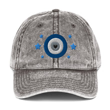 Load image into Gallery viewer, vintage denim cap charcoal grey, with image design of blue eye of protection/evil eye/third eye, with stars. Front view.