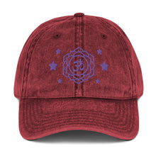 Load image into Gallery viewer, vintage denim cap maroon, with image design of purple third eye chakra symbol, and stars. Front view.