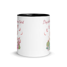 Load image into Gallery viewer, 11 oz. white ceramic coffee/tea mug with solid black handle, rim, and inside. Image Design: Moon phases, colorful pink and green tinged cacti, with "Stay Wild Moon Child" text. Front center view.