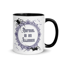 Load image into Gallery viewer, 11 oz. white ceramic coffee/tea mug with solid black handle, rim, and inside. Image Design: Words 'Normal is an Illusion' in a elegant border, with spider silhouettes, and stars. Image phrase: Normal is an Illusion. Right hand side view. Halloween, spooky season.