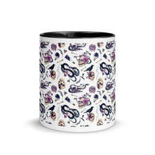 Load image into Gallery viewer, 11 oz. white ceramic coffee/tea mug with solid black handle, rim, and inside. Image Design: gothic theme patter of skulls, wands, snakes, ravens, purple flowers. Center front view.
Halloween, spooky season.