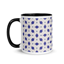 Load image into Gallery viewer, 11 oz. white ceramic coffee/tea mug with solid black handle, rim, and inside. Wrapped around mug is patterned image of eye of protection/evil eye. Left hand side view.
