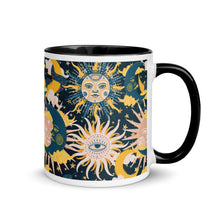Load image into Gallery viewer, enchanting ceramic coffee tea mug featuring a wraparound image of an abstract sun, moon, and star pattern. black colorful rim, handle, and inside mug. Colors in pattern: golden yellow, dark teal, peach coral. side view, handle to right side..