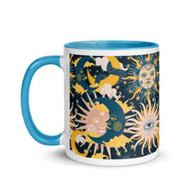 Load image into Gallery viewer, enchanting ceramic coffee tea mug featuring a wraparound image of an abstract sun, moon, and star pattern. light blue colorful rim, handle, and inside mug. Colors in pattern: golden yellow, dark teal, peach coral. side view, handle to leftside.