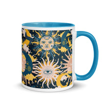 Load image into Gallery viewer, enchanting ceramic coffee tea mug featuring a wraparound image of an abstract sun, moon, and star pattern. light blue colorful rim, handle, and inside mug. Colors in pattern: golden yellow, dark teal, peach coral. side view, handle to right side..