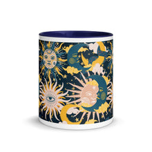 Load image into Gallery viewer, enchanting ceramic coffee tea mug featuring a wraparound image of an abstract sun, moon, and star pattern. dark navy blue colorful rim, handle, and inside mug. Colors in pattern: golden yellow, dark teal, peach coral. Center view, outside.