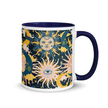 Load image into Gallery viewer, enchanting ceramic coffee tea mug featuring a wraparound image of an abstract sun, moon, and star pattern. dark navy blue colorful rim, handle, and inside mug. Colors in pattern: golden yellow, dark teal, peach coral. side view, handle to right side..