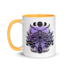 Load image into Gallery viewer, 11 oz. white ceramic coffee/tea mug with solid golden yellow handle, rim, and inside. Design: Moth with a skull, moon phases, pentacle, mushrooms, and a crystal vial. left hand side view.