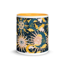 Load image into Gallery viewer, enchanting ceramic coffee tea mug featuring a wraparound image of an abstract sun, moon, and star pattern. yellow colorful rim, handle, and inside mug. Colors in pattern: golden yellow, dark teal, peach coral. center view, outside.