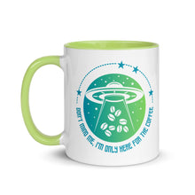 Load image into Gallery viewer, 11 oz. white ceramic coffee/tea mug with solid light green handle, rim, and inside. Image Design: ufo ship abducting/beaming up coffee beans. background blue to light green gradient, stars. Text under image: "Don't mind me, I'm only here for the Coffee." left hand side view.