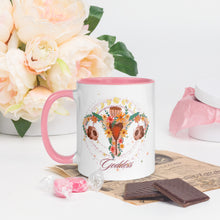 Load image into Gallery viewer, 11 oz. white ceramic coffee/tea mug with solid light pink handle, rim, and inside. Image Design: Female reproductive organ, vagina, uterus, ovaries, with leaves and flowers, moon phases above. left hand side view.