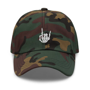 Camouflage print Baseball cap, classic visor shape. Image Design: "Rock On" skeleton hand gesture on the front. Front center view.