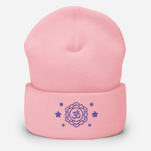 cuffed beanie baby pink, with image design of purple third eye chakra symbol, with purple stars.