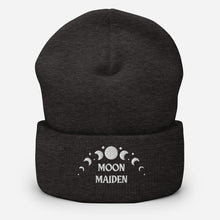 Load image into Gallery viewer, cuffed beanie dark grey, with image phrase &quot;Moon Maiden,&quot; and image graphic of moon phases. background: winter themed, Christmas gifts.
