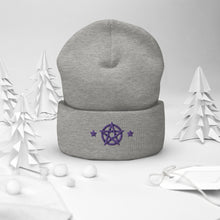 Load image into Gallery viewer, cuffed beanie heather grey, with image design of purple pentacle and stars. background: winter themed, Christmas gifts.
