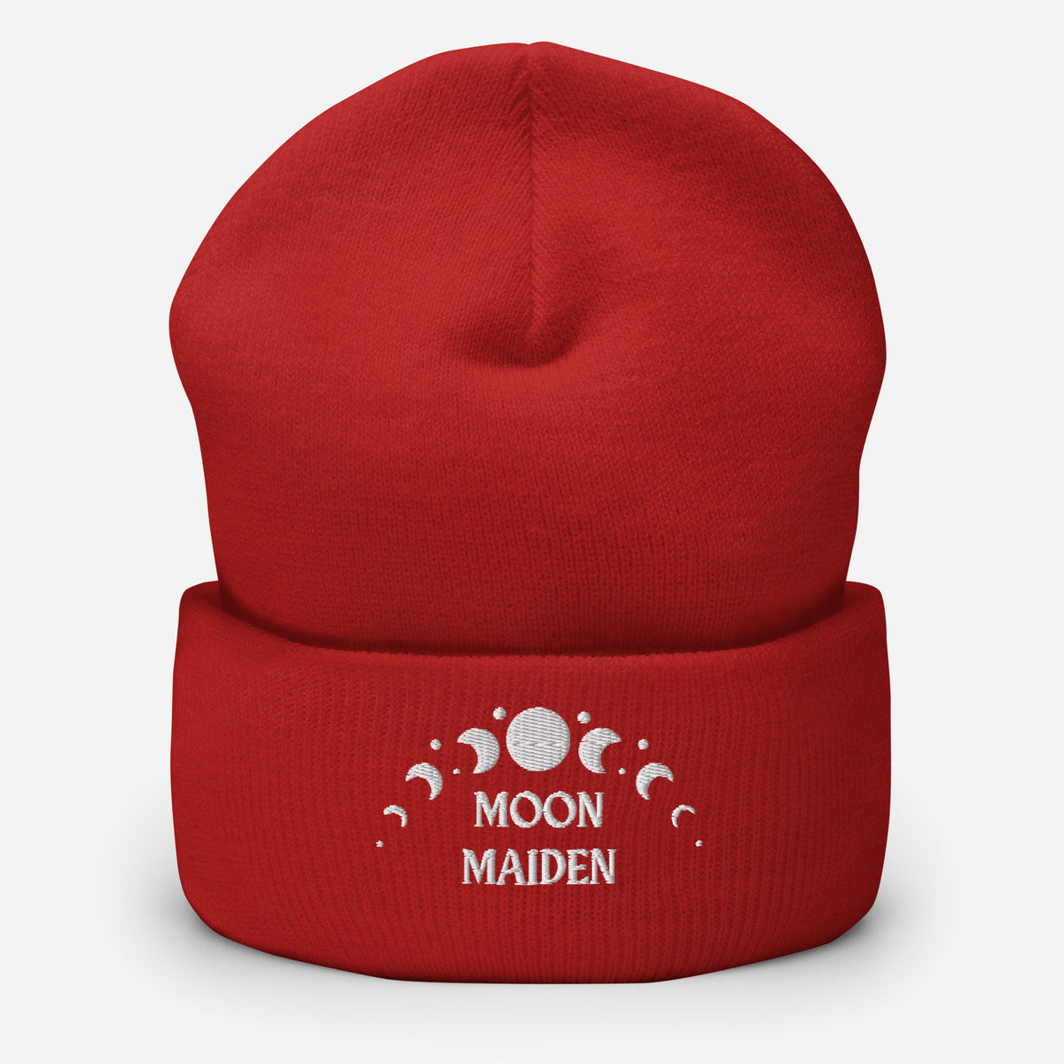 cuffed beanie red, with image phrase "Moon Maiden," and image graphic of moon phases. background: winter themed, Christmas gifts.