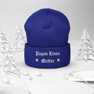 cuffed beanie royal blue, with image phrase "Pagan Lives Matter." background: winter themed, Christmas gifts.