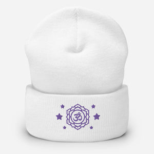 cuffed beanie white, with image design of purple third eye chakra symbol, with purple stars.